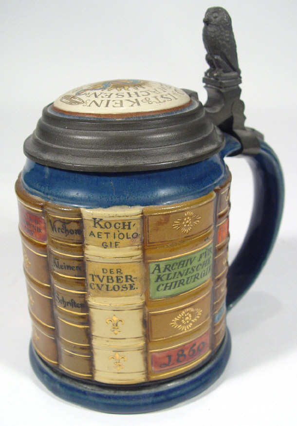 Appraisal: Mettlach stoneware tankard relief moulded and painted with a continuous