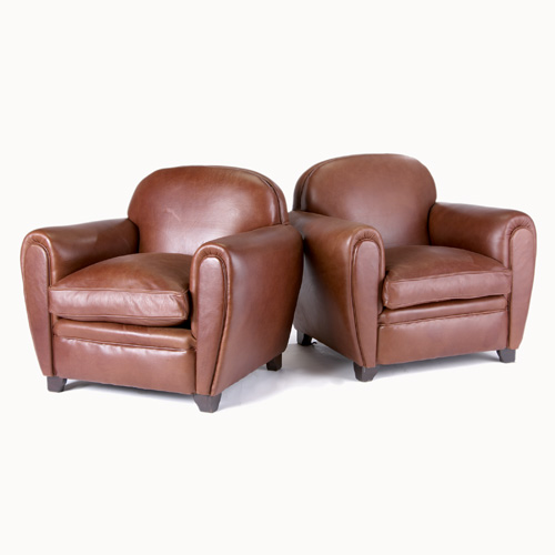 Appraisal: ART DECO Pair of club chairs upholstered in brick red