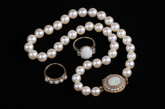 Appraisal: THREE PIECES K YELLOW GOLD AND PRECIOUS WHITE OPAL JEWELRY