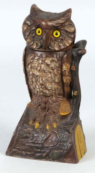 Appraisal: Cast Iron Owl Turns Head Mechanical Bank Description Manufactured by