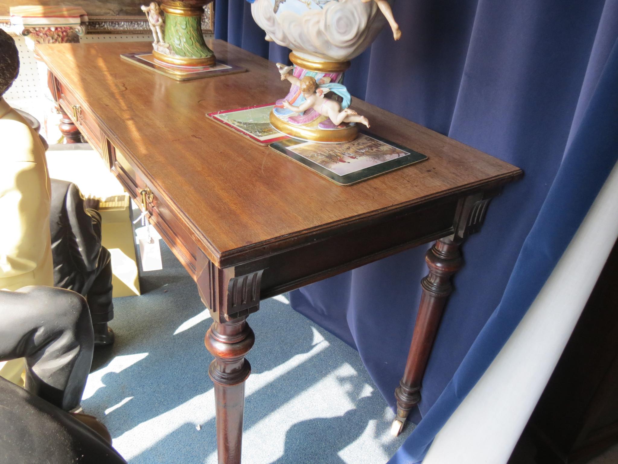 Appraisal: A late Victorian mahogany serving table rectangular with two frieze