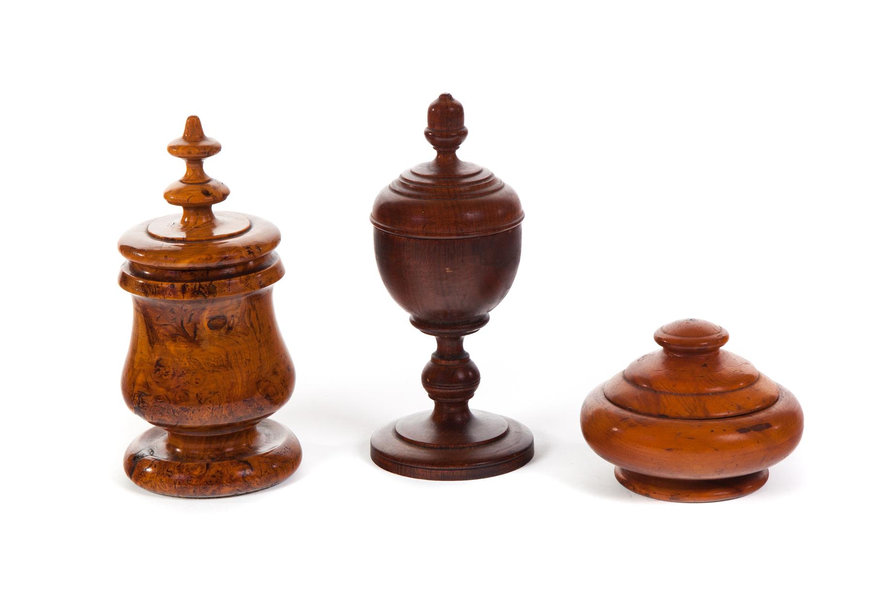 Appraisal: THREE TURNED WOODEN LIDDED PIECES Late th and early th