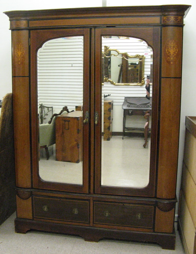 Appraisal: AN EDWARDIAN INLAID MAHOGANY WARDROBE English c The wardrobe is