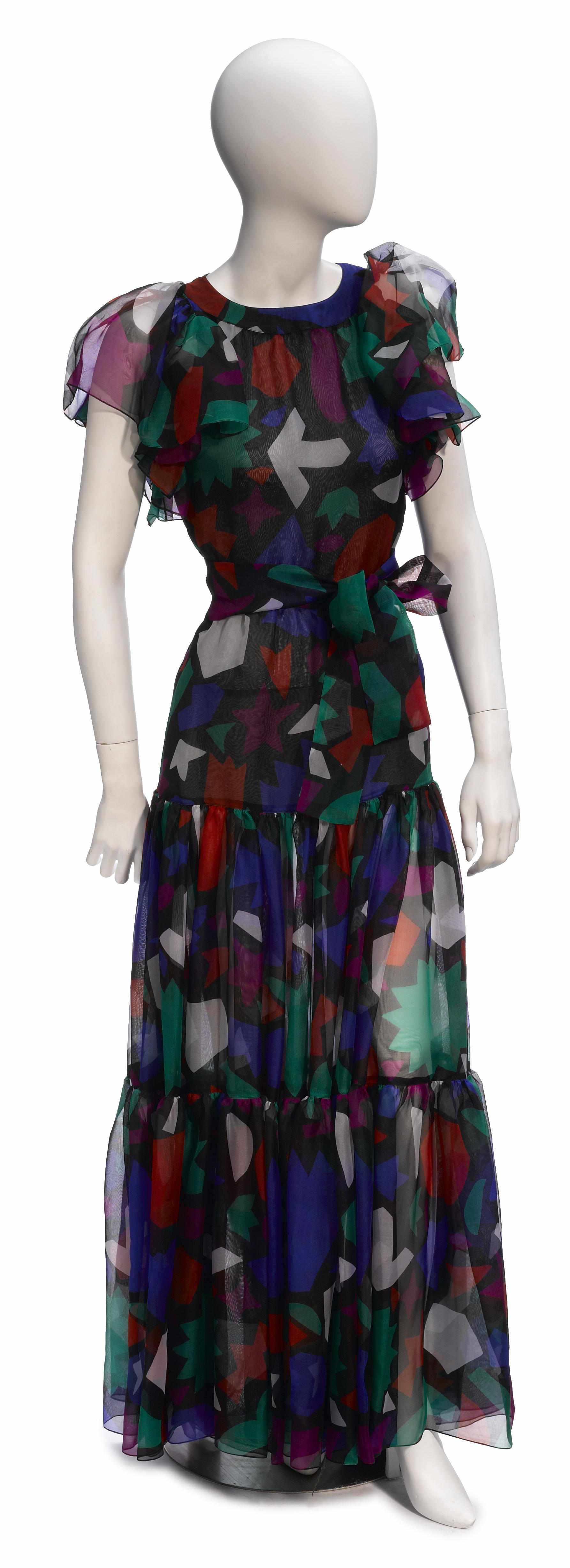 Appraisal: An Yves St Laurent long sheer multicolored gown size together