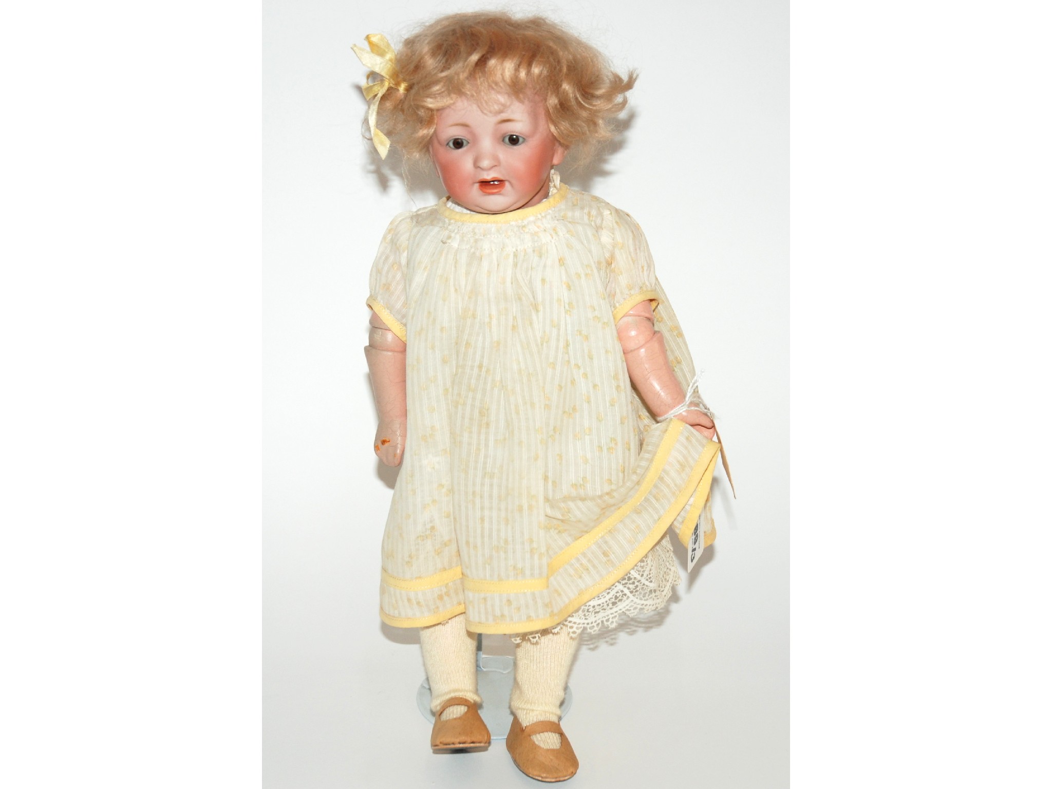 Appraisal: A Kestner bisque-headed character dollwith open and close brown eyes