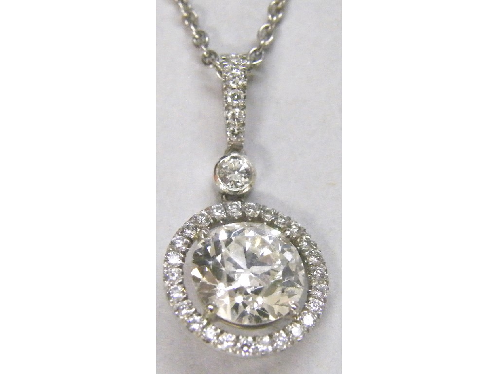 Appraisal: Fine white gold solitaire diamond pendant halo set with diamonds