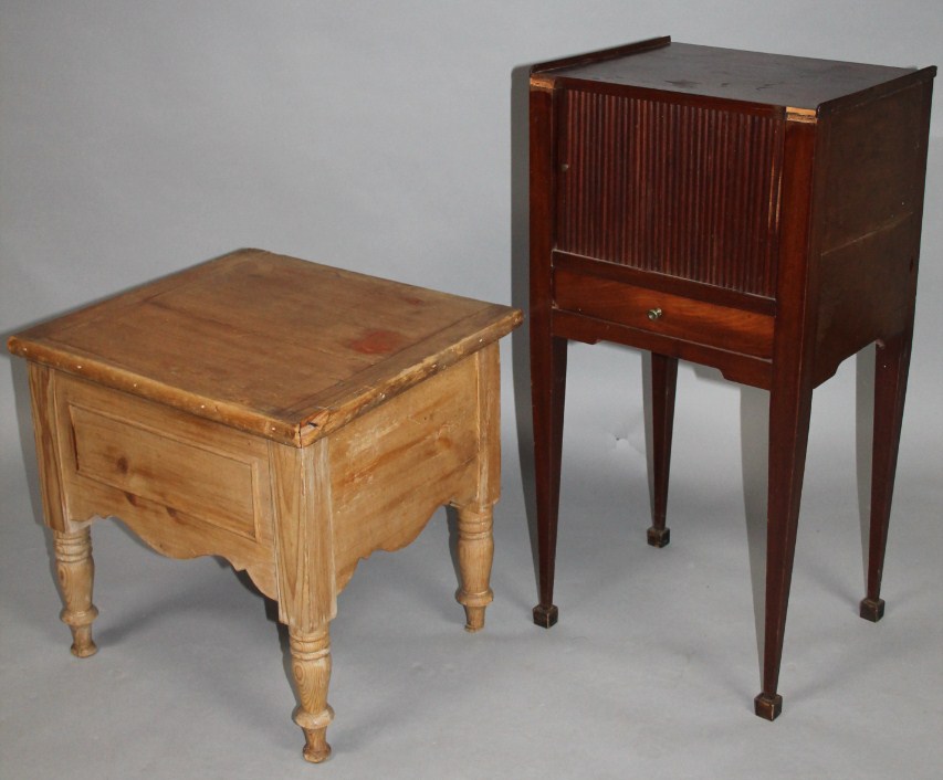 Appraisal: A thC mahogany bedside cabinet with a tambour slide front