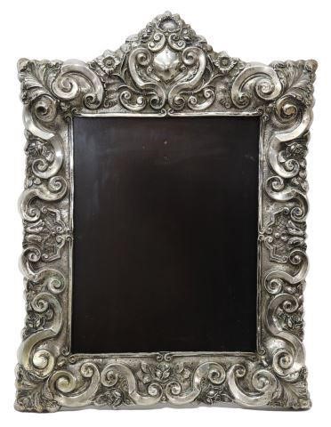 Appraisal: Large repousse silver content unknown table frame hallmarked EC and