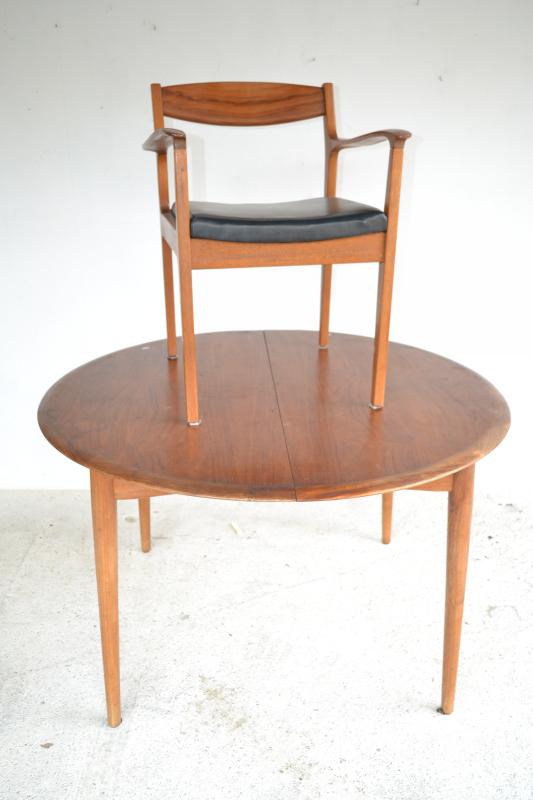 Appraisal: A 'S PARKER CIRCULAR EXTENSION DINING TABLE AND FOUR MATCHING