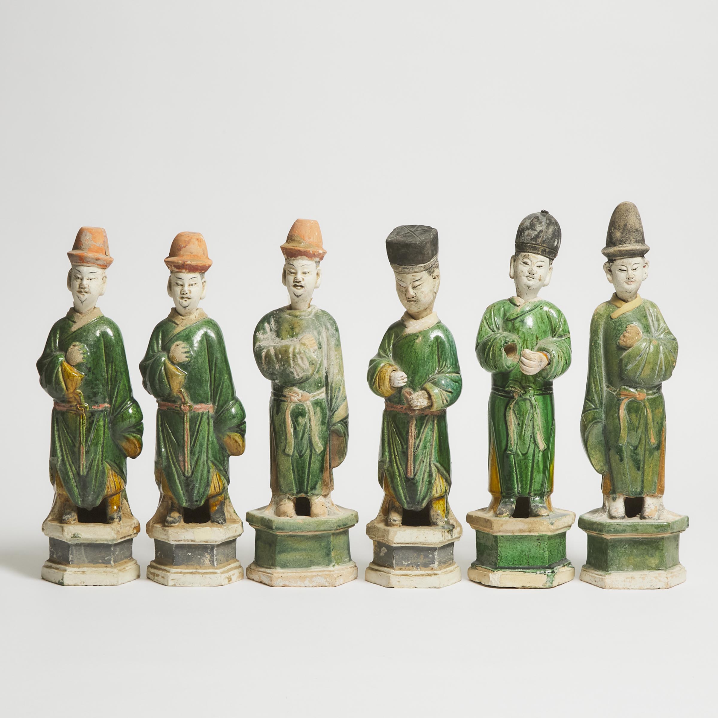 Appraisal: A Set of Six Large Sancai-Glazed Pottery Attendants Ming Dynasty