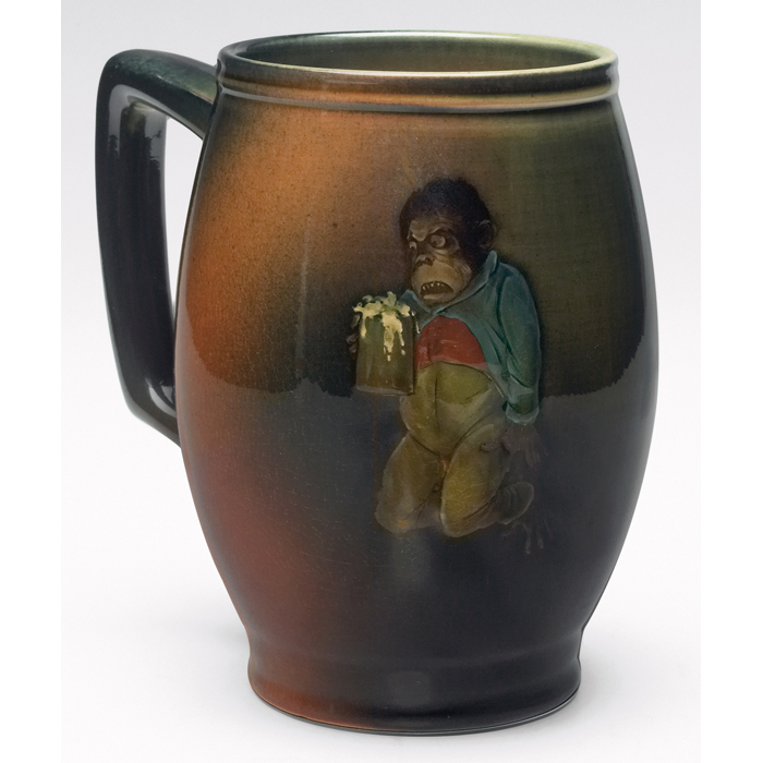 Appraisal: Rookwood handled vessel green Standard glaze with a humorous painting