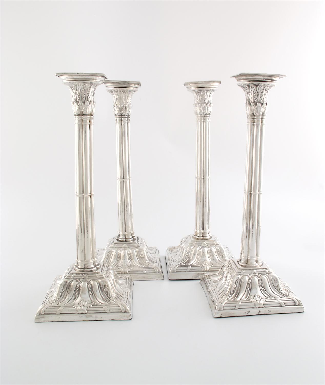 Appraisal: A set of four George III old Sheffield plated candlesticks