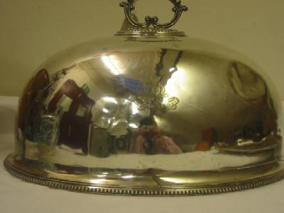 Appraisal: A VICTORIAN MEAT COVER of domed oval form with chased