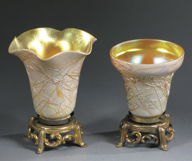 Appraisal: TWO STEUBEN ART GLASS LAMP SHADES mounted on matching gilt