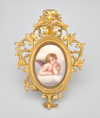 Appraisal: A Hand Painted Porcelain Plaque of a Cherub Framed in