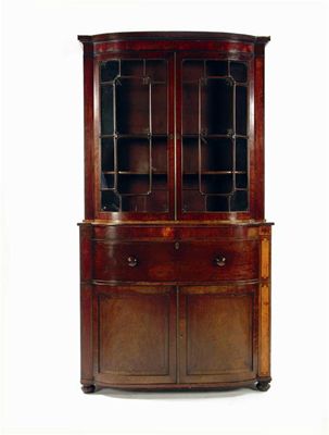 Appraisal: A George IV mahogany barrel front secretaire bookcase with ebonised