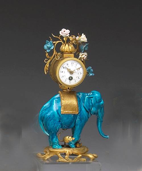 Appraisal: A Louis XV style gilt bronze and porcelain elephant clock