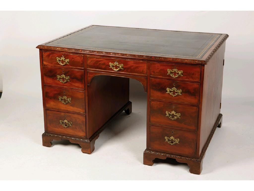 Appraisal: AN EDWARDIAN MAHOGANY CHIPPENDALE STYLE LIBRARY DESK the rectangular top