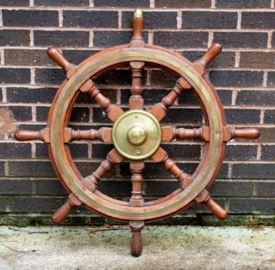 Appraisal: A brass mounted eight-point ships wheel cm diameter