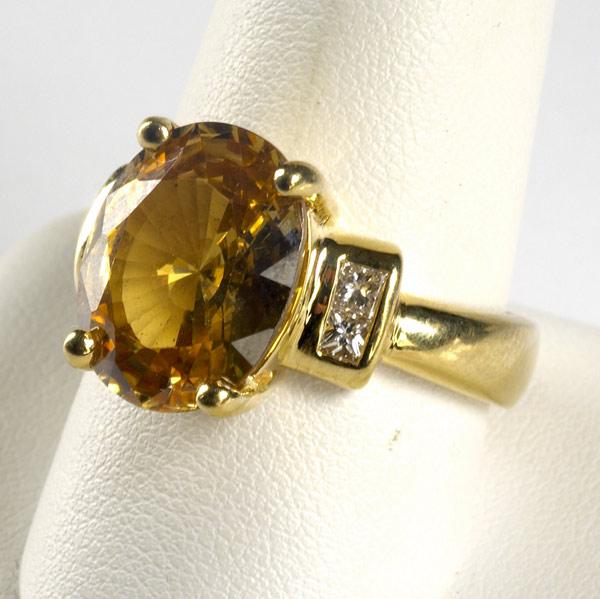 Appraisal: NATURAL HONEY COLORED ZIRCON AND DIAMOND RING Heavy k ring