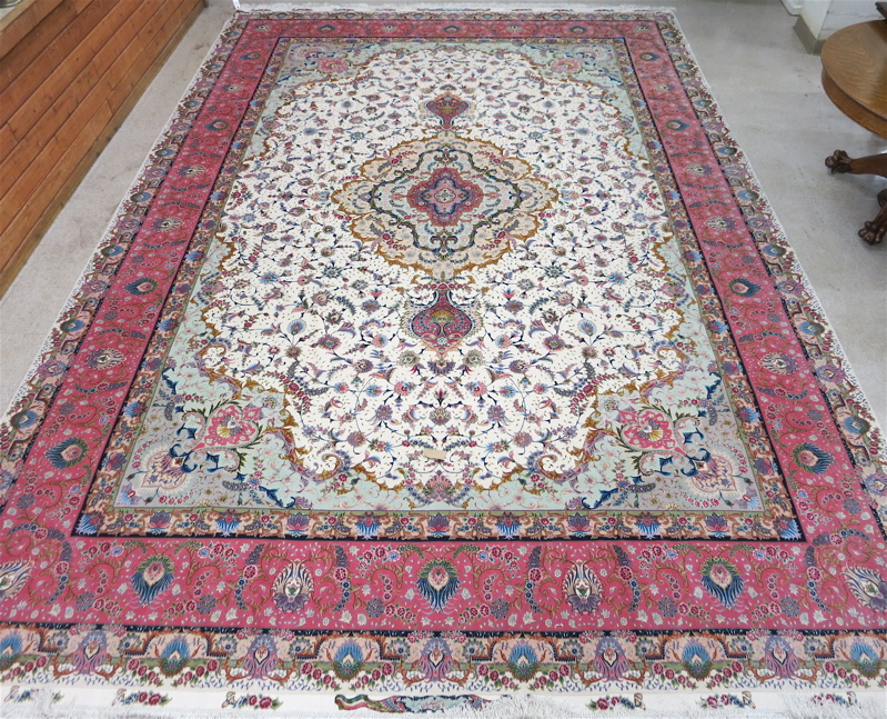 Appraisal: A CONTEMPORARY PERSIAN WOOL AND SILK CARPET colorful floral and