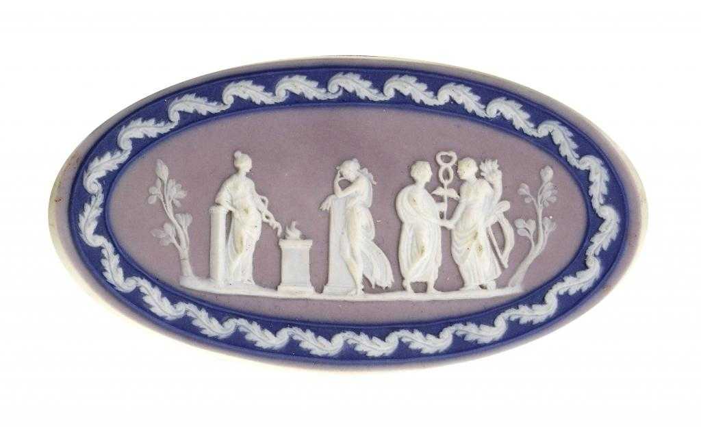 Appraisal: A WEDGWOOD JASPER TRICOLOUR CAMEO in lilac and dark blue