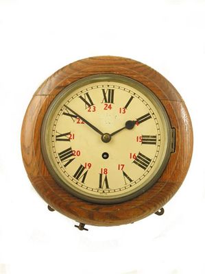 Appraisal: Railway Interest An oak cased wall clock with a single