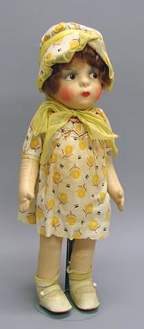 Appraisal: Eugene Poir mask face cloth doll Highly colored cloth mask