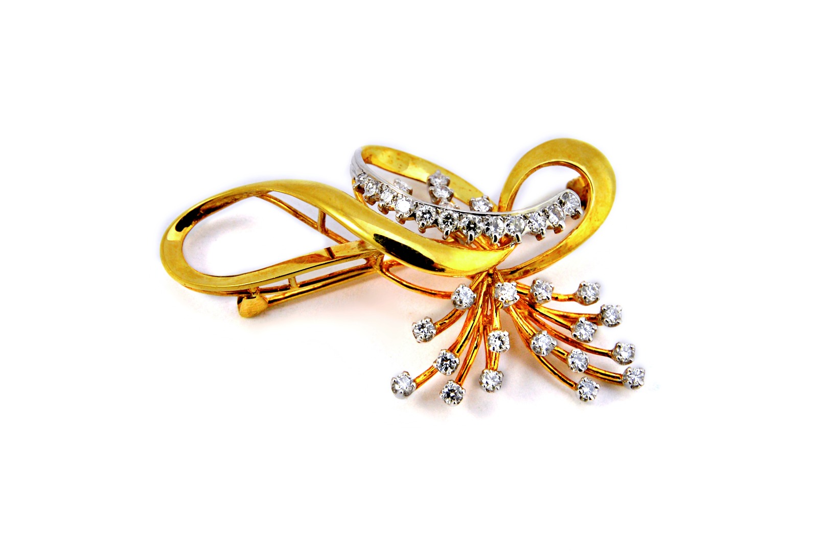 Appraisal: A gold and diamond set brooch in a wirework spray