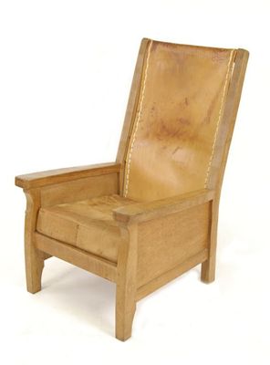 Appraisal: A Robert Mouseman Thompson oak armchair with leather seat and