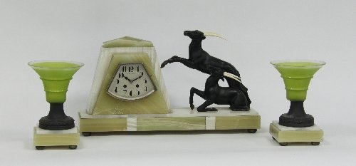 Appraisal: An Art Deco clock garniture the onyx mantel clock with