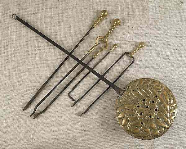 Appraisal: Group of brass fireplace accessories th c to include andirons