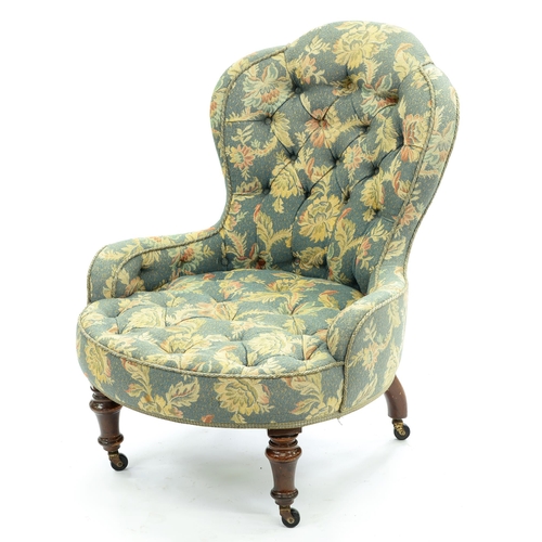 Appraisal: A Victorian nursing chair buttoned upholstery on walnut legs with