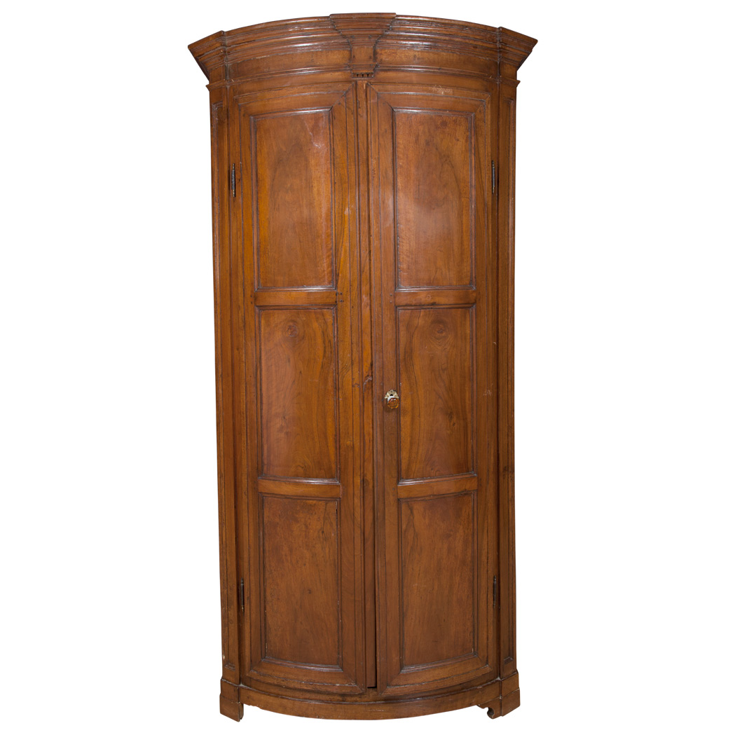 Appraisal: Continental Walnut Cupboard Mid th century The molded bowfronted cornice