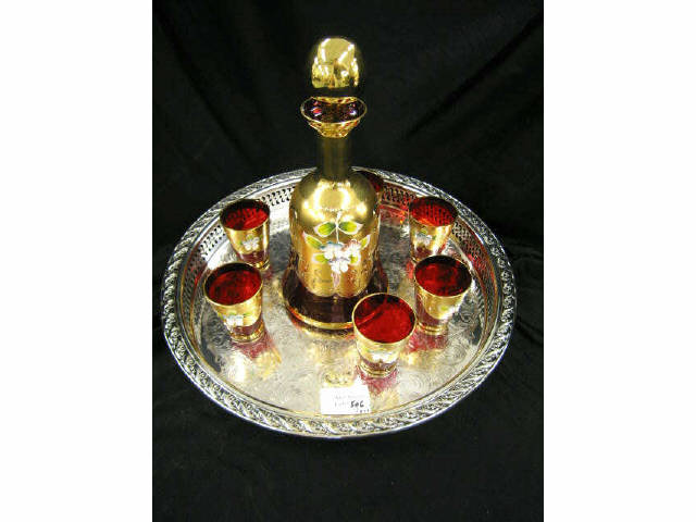 Appraisal: Ruby Art Glass Decanter and Six Cordials floral gold trim