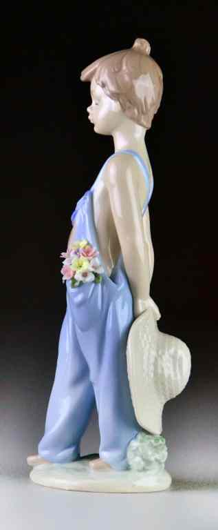 Appraisal: Lladro Porcelain Figurine ''Pocket Full of Wishes''''Son Para Ti'' depicting