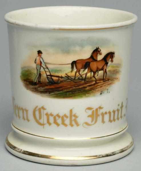 Appraisal: Man with Plow Shaving Mug Gilt writing Fern Creek Fruit