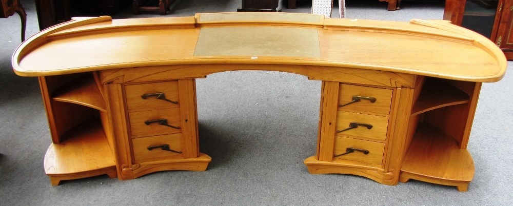 Appraisal: A large oak desk after the model by Henry Van