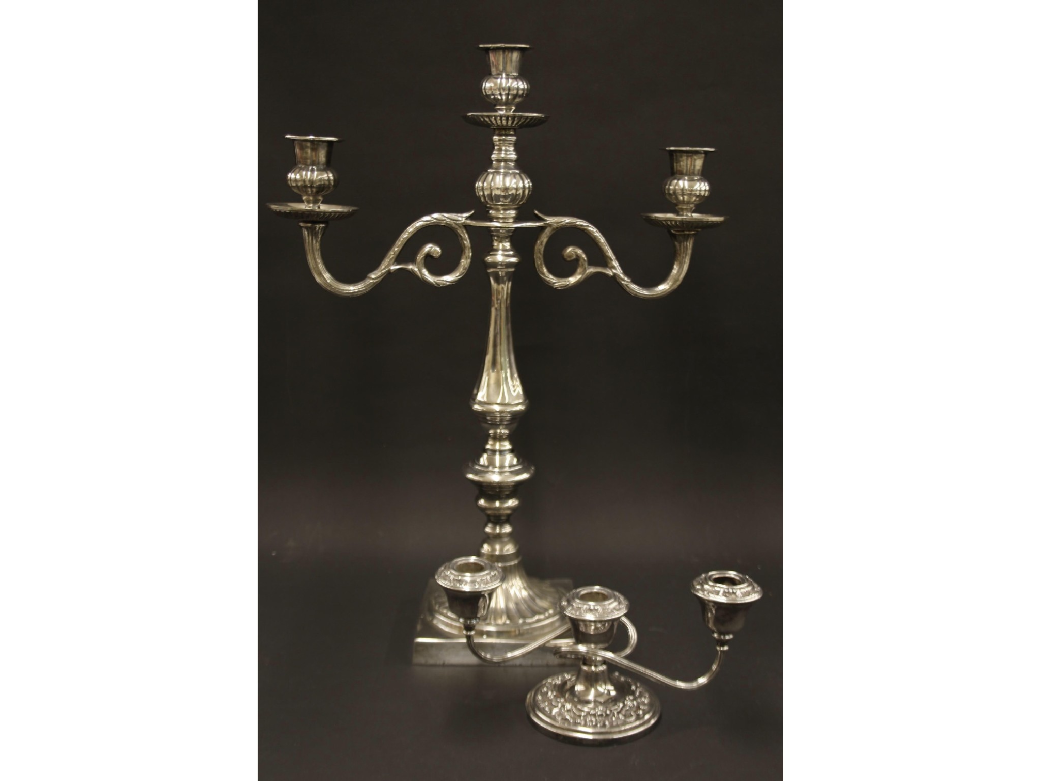 Appraisal: Silver plated twin branch candelabra with baluster column and scroll