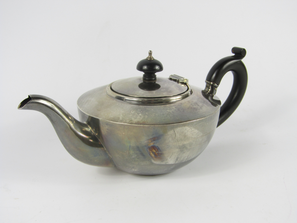 Appraisal: A George VI silver tea pot with ebonised knop and