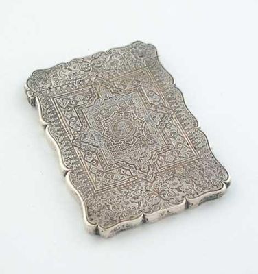 Appraisal: A Victorian card case profusely engraved and centred on one