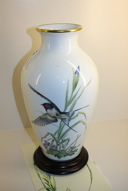 Appraisal: A FRANKLIN PORCELAIN MEADOW LAND BIRD VASE on stand with