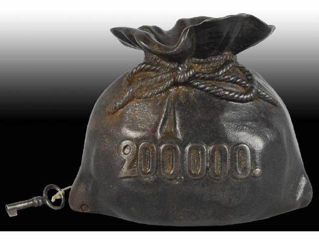 Appraisal: Cast Iron Money Bag Still Bank with Key Description Made