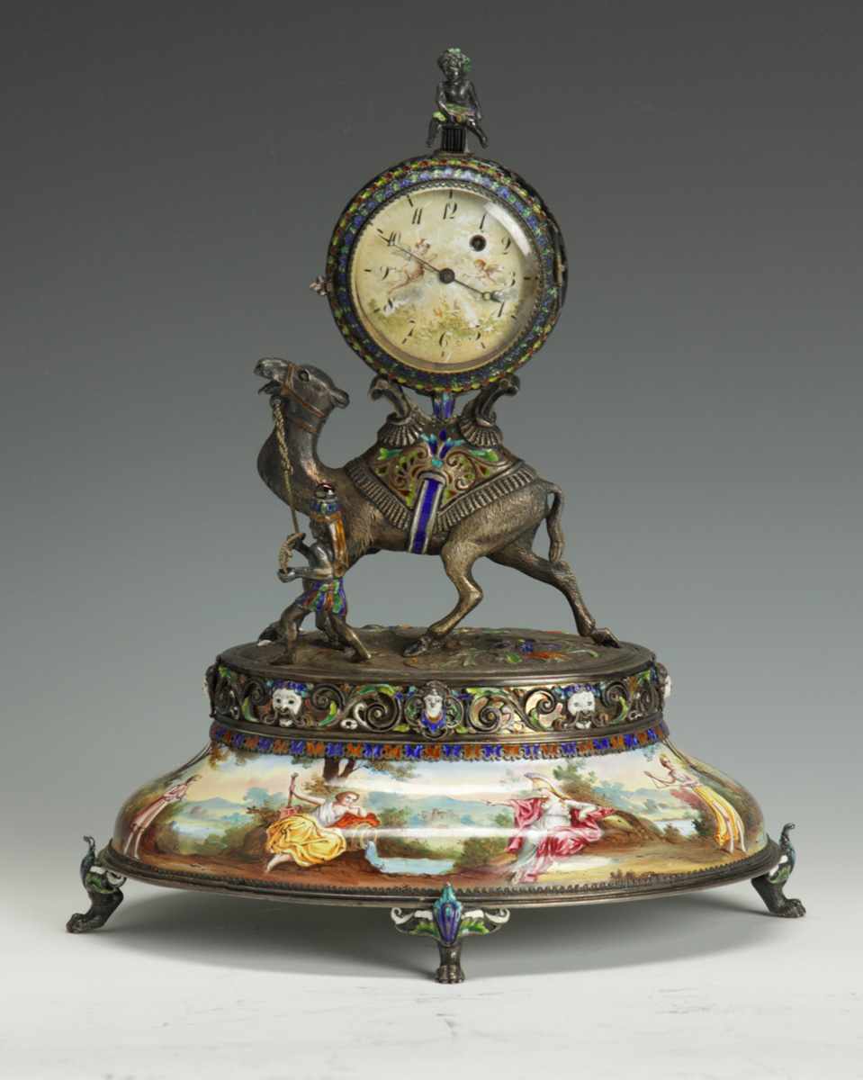 Appraisal: Viennese Silver Enamel Camel-Form Table Clock th cent Putti holding