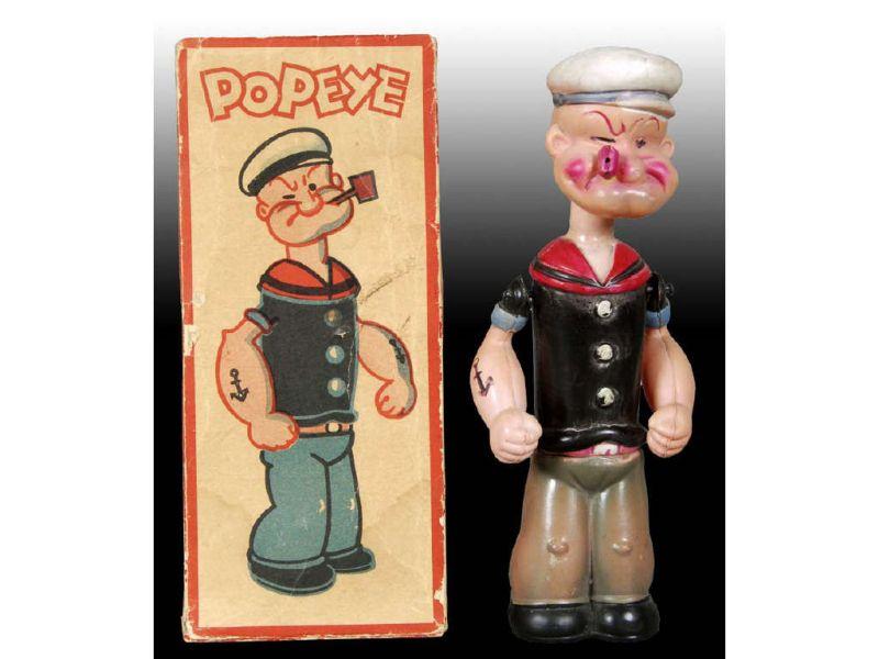 Appraisal: Celluloid Popeye Head Up Down Toy with Original Description ''