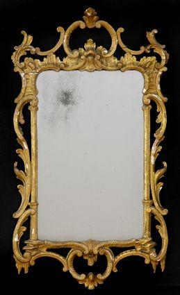 Appraisal: GEORGE III CARVED GILTWOOD SMALL MIRROR The pierced frame carved