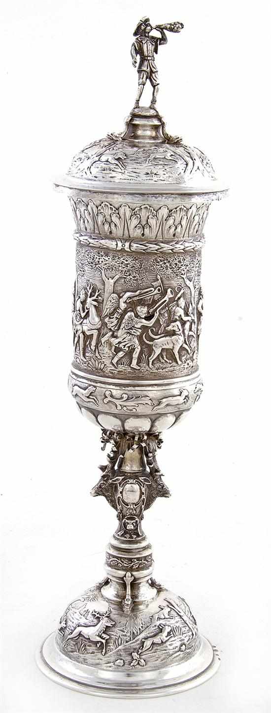 Appraisal: Continental silver covered cup th century huntsman finial on domed