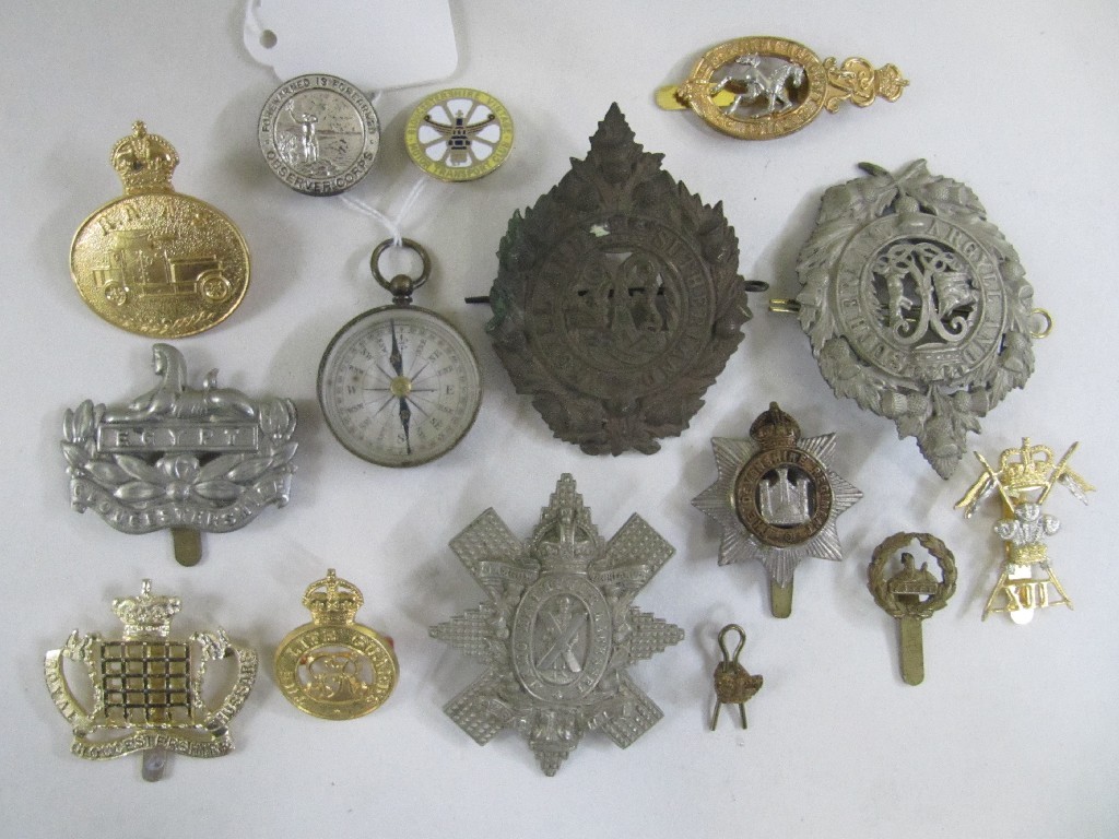 Appraisal: Box of military and other badges and a compass