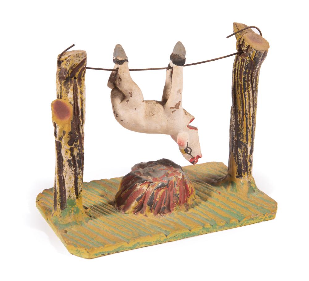 Appraisal: Polychrome Pottery Model of a Lamb Being Roasted on an