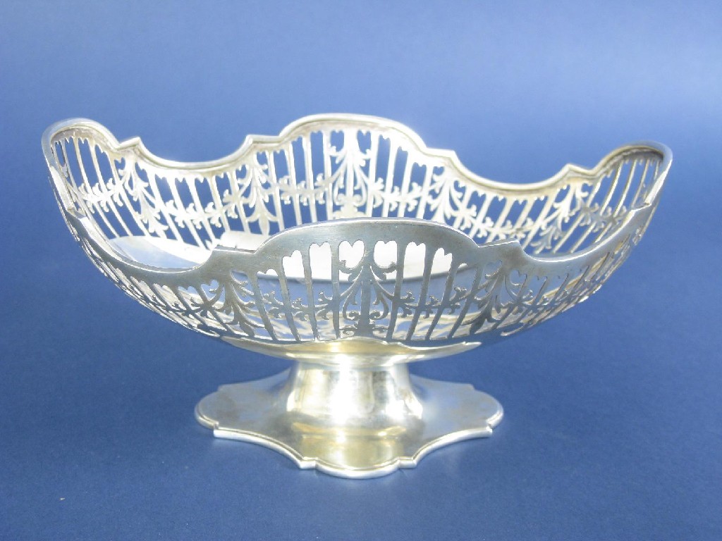 Appraisal: A George V pierced oval Basket with leafage swag and